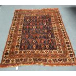 A BLUE AND YELLOW GROUND EASTERN RUG decorated with medallions. 5Ft 4ins x 4ft 1ns.
