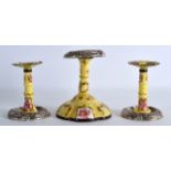 A PAIR OF 19TH CENTURY CONTINENTAL ENAMEL CANDLESTICKS with plated bases, together with a matching