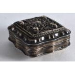 A SMALL CONTINENTAL SILVER SQUARE BOX AND COVER decorated with a heart shaped central motif. 2.25ins