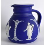 A MID 19TH CENTURY WEDGWOOD JASPERWARE BULBOUS JUG decorated with classical figures beside