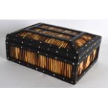 A LATE 19TH CENTURY CEYLON CARVED PORCUPINE QUILL BOX with ivory inlay. 8.25ins wide.