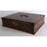 AN 18TH CENTURY CONTINENTAL CARVED WOOD TABLE DESK BOX with gilt engraved handles. 1Ft 6.5ins wide.