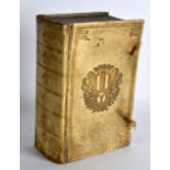 AN EARLY 19TH CENTURY VELLUM 'FAUX IVORY' HIDDEN STORAGE BOX in the form of a book. 8.25ins wide.