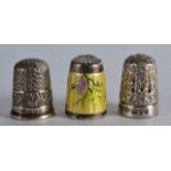 A SILVER THIMBLE by Charles Horner, together with two others. (3)