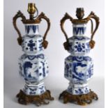 A LOVELY PAIR OF 17TH CENTURY CHINESE BLUE AND WHITE HEXAGONAL VASES Kangxi, painted with figures in