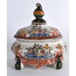 A VINTAGE MAKKUM FAIENCE GLAZED MINIATURE TUREEN AND COVER painted with birds & foliage. 5.25ins