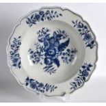 AN 18TH CENTURY WORCESTER UNCOMMON SOUP PLATE printed with the Pine Cone pattern. 9.75ins diameter.