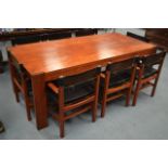 A GOOD HEAVY EASTERN TEAK RECTANGULAR TABLE AND CHAIRS of stylish form. Table 7ft 4ins x 3ft 4ins.