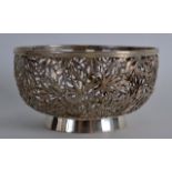 A GOOD 19TH CENTURY CHINESE EXPORT PIERCED SILVER BOWL by Luen Wo, modelled with birds amongst