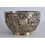 A GOOD 19TH CENTURY CHINESE EXPORT PIERCED SILVER BOWL by Wo Shing, decorated with a bird amongst