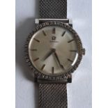 A GOOD 1960S 18CT WHITE GOLD OMEGA AND DIAMOND WRISTWATCH. 1.25ins diameter.