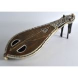 A 19TH CENTURY TURKISH CARVED IVORY AND TORTOISESHELL MUSICAL INSTRUMENT with elaborate carved