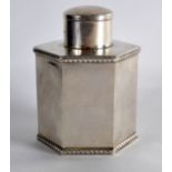 AN EDWARDIAN HEXAGONAL SILVER TEA CADDY AND COVER. 3.75ins high.