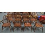 A GOOD SET OF EIGHT COUNTRY WINDSOR DINING CHAIRS 18th Century style, including two carvers, with