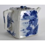 A CHINESE BLUE AND WHITE SQUARE FORM TEAPOT AND COVER painted with landscapes, with fruiting finial.