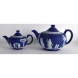 A 19TH CENTURY WEDGWOOD JASPERWARE TEAPOT & COVER decorated with figures and trees, together with