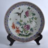 A 19TH CENTURY CHINESE FAMILLE ROSE PORCELAIN DISH Tongzhi, painted with flowers and a bird. 11.