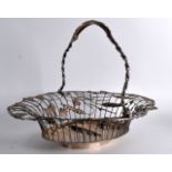 A GOOD MID VICTORIAN SILVER SWING HANDLED BASKET overlaid all over with grape vines, acorn leaves