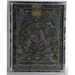 AN EARLY 20TH CENTURY SINO TIBETAN FRAMED THANGKA decorated with numerous figures in various