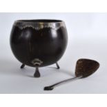 A 19TH CENTURY SILVER MOUNTED COCONUT SHELL together with a matching silver spoon. (2)
