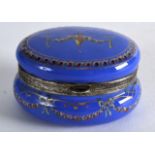 A GOOD 18TH CENTURY SILVER MOUNTED ENAMEL PILL BOX AND COVER painted upon a puce ground with