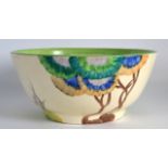 A CLARICE CLIFF BIZZARE BOWL painted with foliage under a green rim. 6.5ins diameter.
