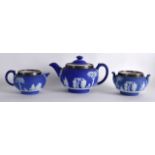 A 19TH CENTURY WEDGWOOD SILVER MOUNTED JASPERWARE THREE PIECE TEA SERVICE decorated with classical