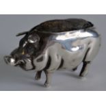 A LATE VICTORIAN/EDWARDIAN SILVER NOVELTY 'PIG' PIN CUSHION. 2.25ins wide.