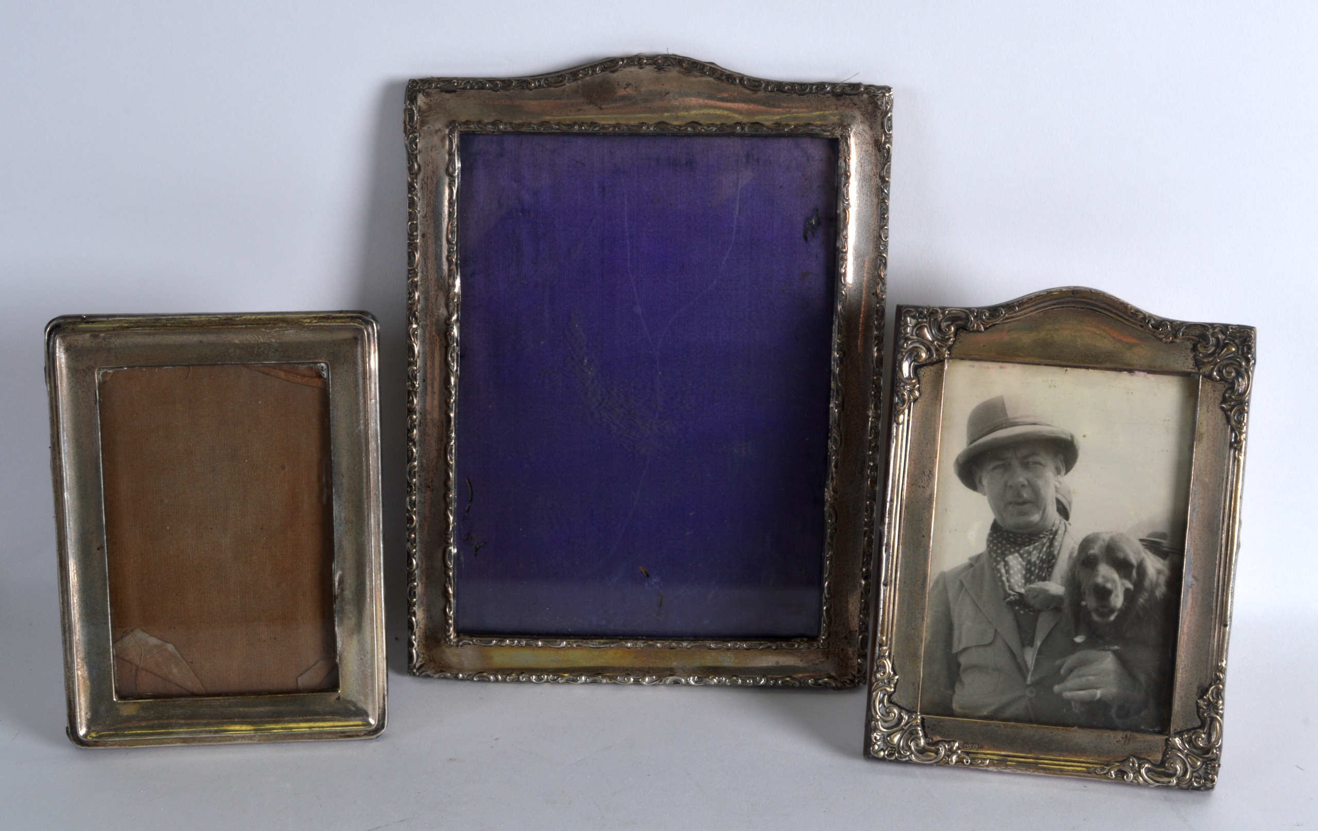 A GROUP OF THREE SILVER MOUNTED PHOTOGRAPH FRAMES of various sizes. (3)