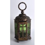 A LATE 19TH CENTURY DUTCH SILVER LANTERN with repousse shell decoration. 11.5oz. 8.25ins high.