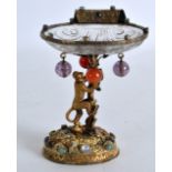 A MID 19TH CENTURY CONTINENTAL SILVER GILT AND ENAMEL BON BON DISH modelled as a monkey clambering