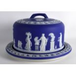 A LARGE 19TH CENTURY WEDGWOOD JASPERWARE STILTON DISH AND COVER decorated with classical figures,