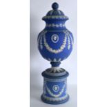 AN IMPRESSIVE EARLY 19TH CENTURY BLUE JASPERWARE VASE AND COVER Attributed to Wedgwood, with applied