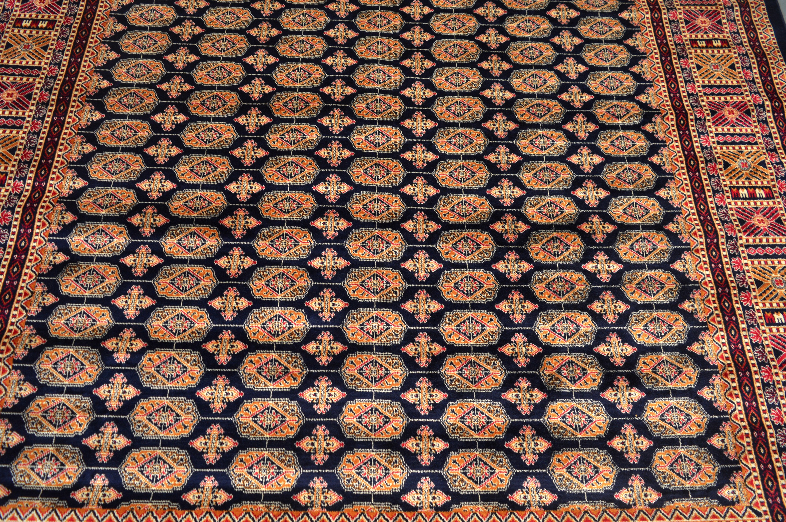 A BLUE GROUND BOKHARA CARPET. 2.8m x 2m. - Image 2 of 3