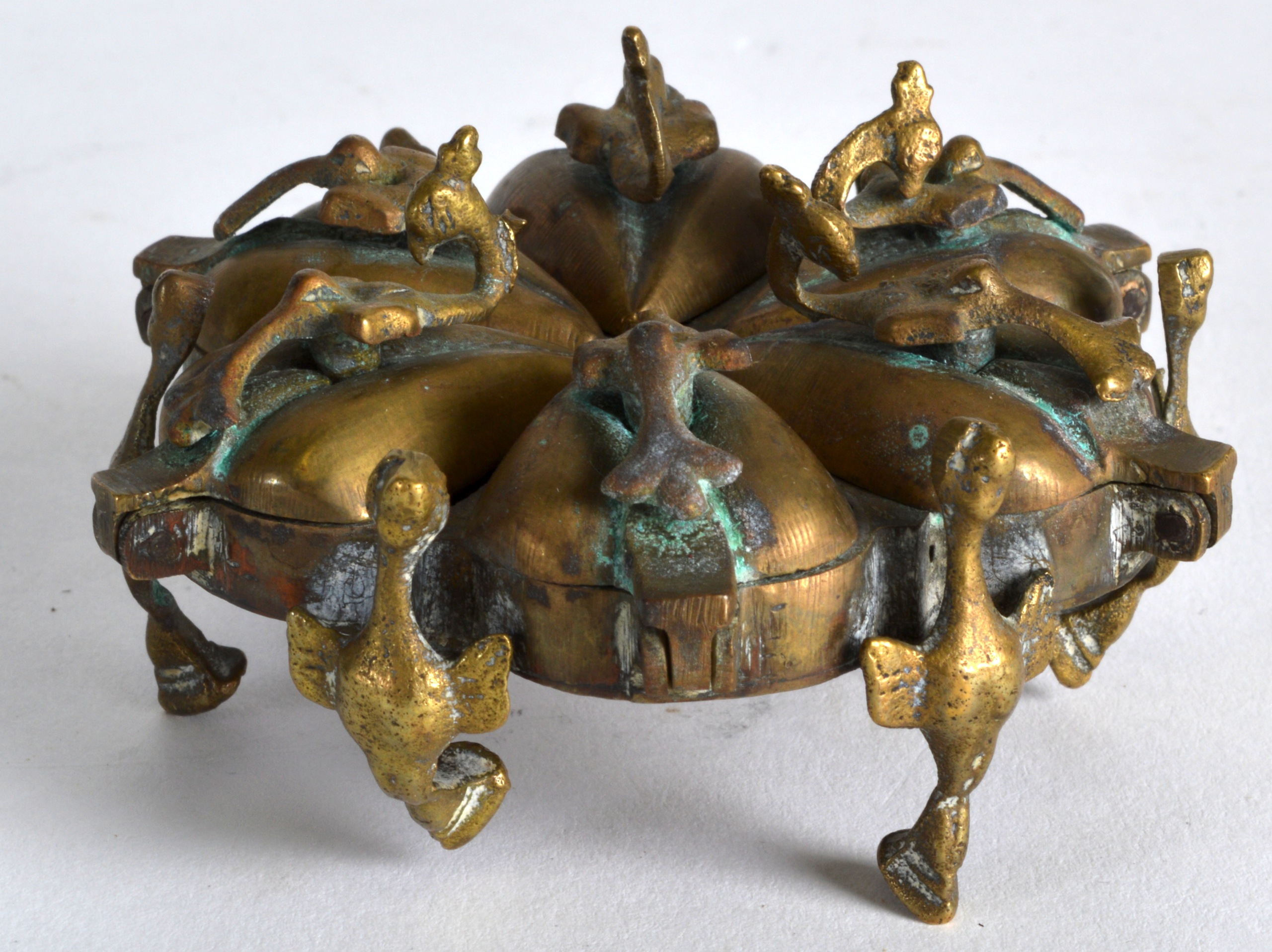 A 19TH CENTURY INDIAN BRONZE PANDAN SPICE BOX AND COVER. 3.5ins wide.