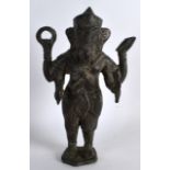 AN EARLY 20TH CENTURY INDIAN BRONZE FIGURE OF GANESA modelled holding various buddhistic implements.