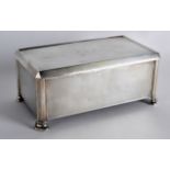 AN ART DECO SILVER CIGARETTE BOX with delicate engine turned body. Birmingham 1929. 23oz. 7.25ins