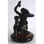 A FINE 19TH CENTURY EUROPEAN BRONZE FIGURE OF BACCHUS elegantly modelled holding pipes beside a