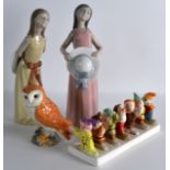 TWO LLADRO FIGURES OF YOUNG GIRLS together with a Beswick Owl and Seven dwarf toast rack. (4)