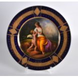 AN EARLY 20TH CENTURY VIENNA PORCELAIN CABINET PLATE painted with a classical female and child