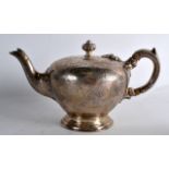 A VICTORIAN SCOTTISH SILVER TEAPOT with floral engraving. Edinburgh 1844. 11oz. 7.5ins wide.