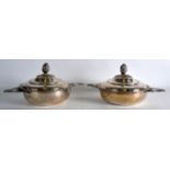 A LOVELY PAIR OF 19TH CENTURY FRENCH TWIN HANDLED SILVER TUREENS AND COVERS with fruiting finials,