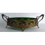 A STYLISH ART NOUVEAU TWIN HANDLED BRASS BOWL Attributed to WMF, decorated with stylised swans and
