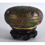 AN EARLY 20TH CENTURY CHINESE CLOISONNE ENAMEL CIRCULAR BOX AND COVER decorated with foliage and