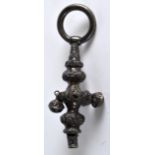 A VICTORIAN SILVER EMBOSSED BABIES TEETHING RATTLE. 5.25ins long.
