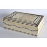 A MID 19TH CENTURY ANGLO INDIAN IVORY RECTANGULAR BOX AND COVER engraved with scrolling foliage