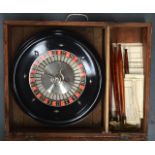 AN EARLY 20TH CENTURY CASED ROULETTE SET of large proportions
