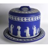 A LARGE 19TH CENTURY WEDGWOOD JASPERWARE CHEESE DISH AND COVER decorated with classical figures, the