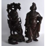 A 19TH CENTURY CHINESE CARVED HARDWOOD FIGURE OF A WARRIOR together with another hardwood figure