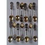 A SET OF THIRTEEN LATE 19TH/20TH CENTURY CHINESE SILVER SPOONS in various forms and sizes. (13)